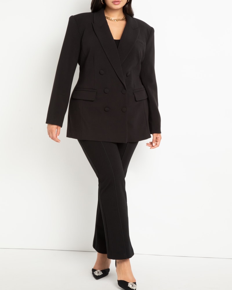 Front of a model wearing a size 14 The Ultimate Suit Flare Leg Pant in Black by ELOQUII. | dia_product_style_image_id:236787
